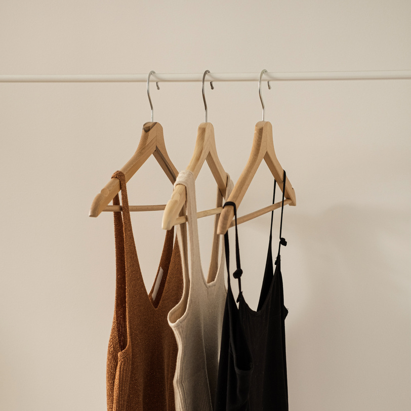 Woman's Neutral Clothes on Clothing Rack